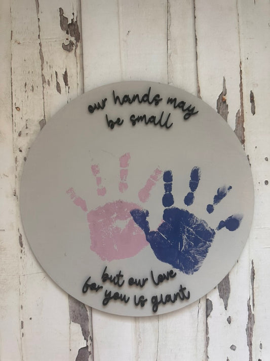 Our Hands May Be Small Sign